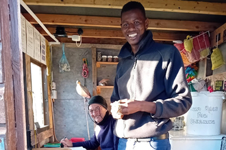 A man ringing a bird. 