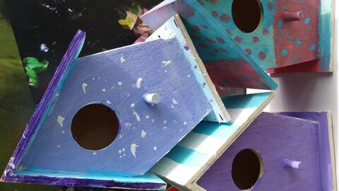 3 small painted bird houses