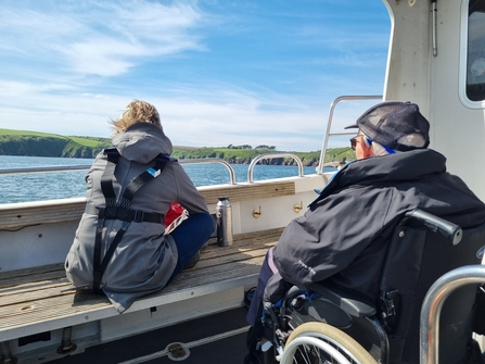 Two people on a boat. 