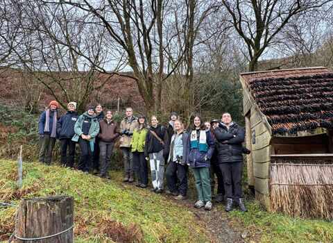 Members of the Stand for Nature Cardiff group stand facing the camera while out on a walk